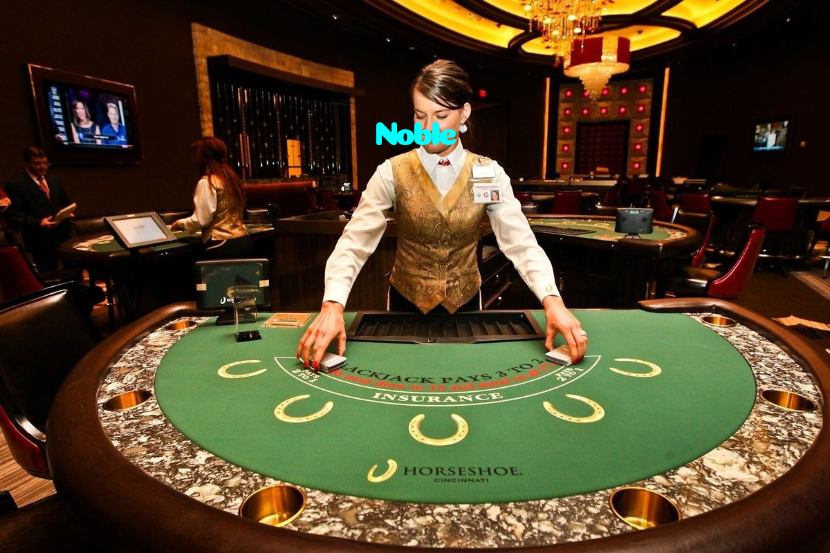 Noble casino presented on mobile device in Pakistan with slots and live games